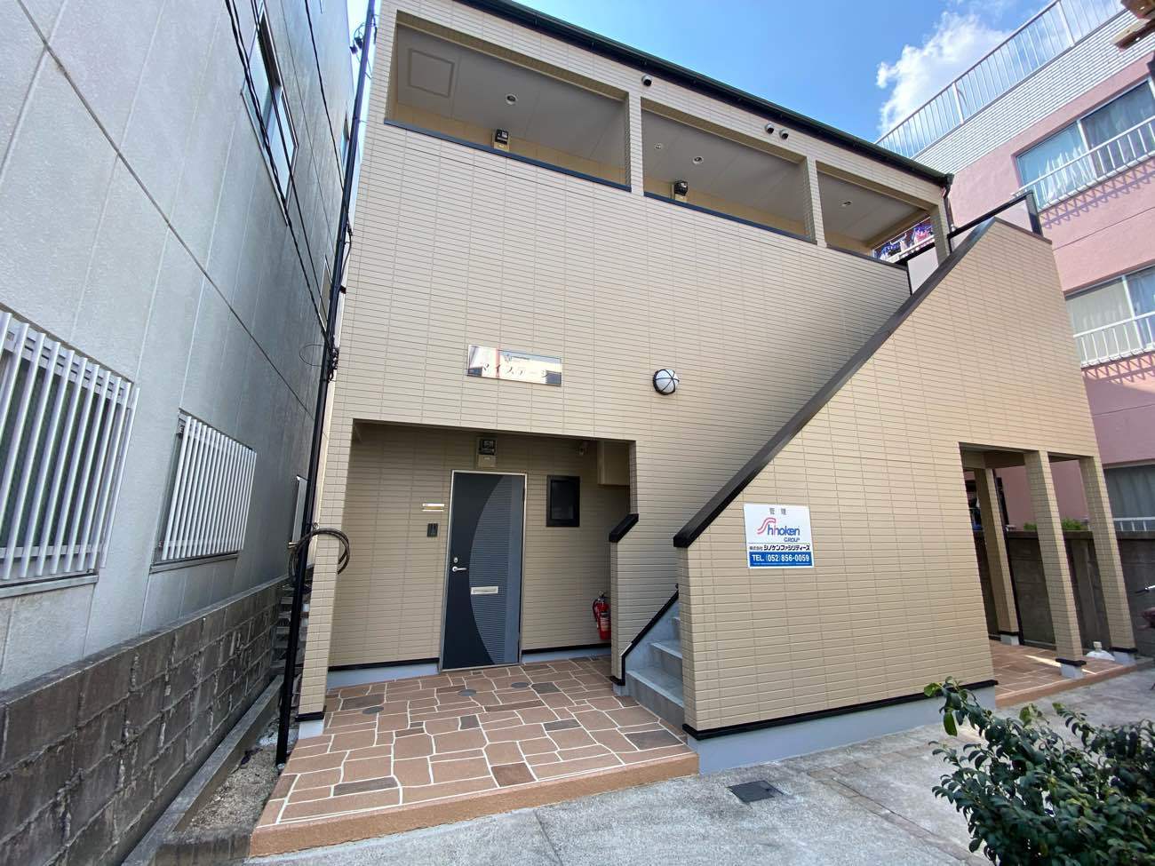 愛知県名古屋市北区　アパート　外壁塗装　全景　施工完了